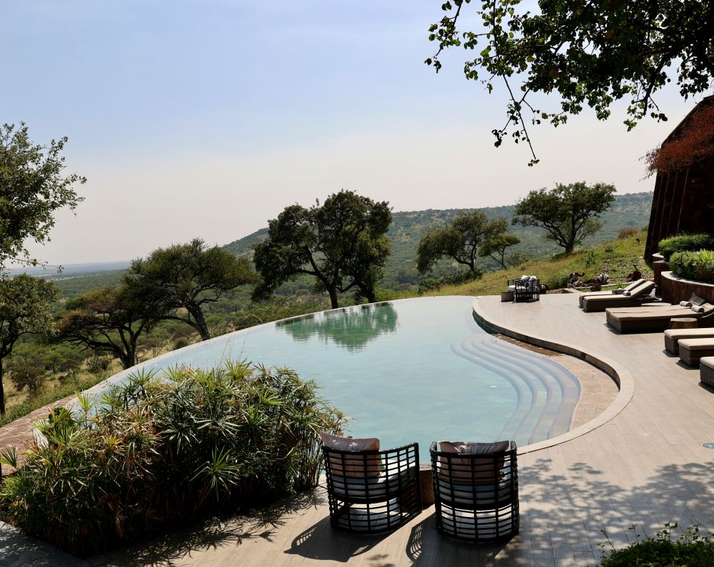 Luxury safari lodge with infinity pool overlooking the African wilderness