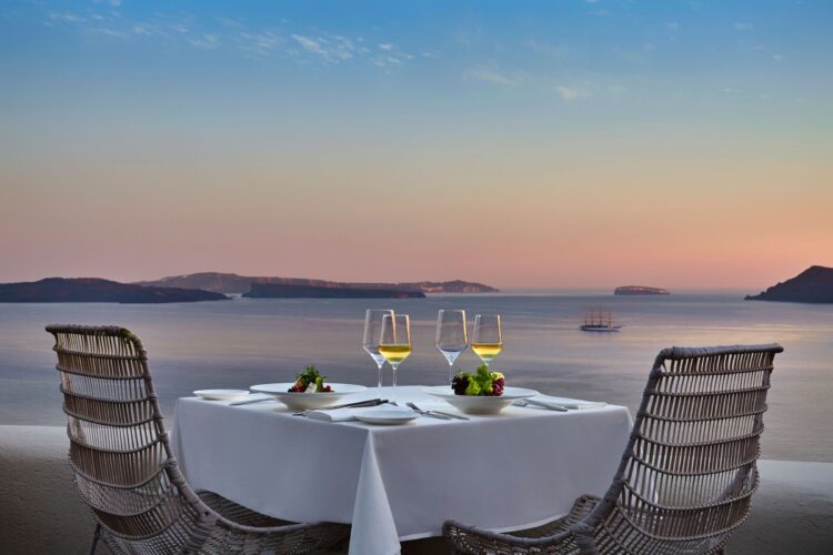 Romantic private dinner overlooking the sea at Mystique Santorini
