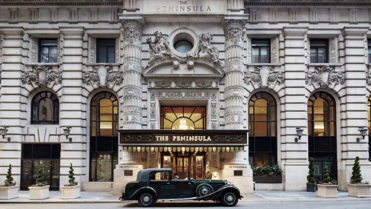 Main entrance of a Peninsula hotel with the hotel doorman