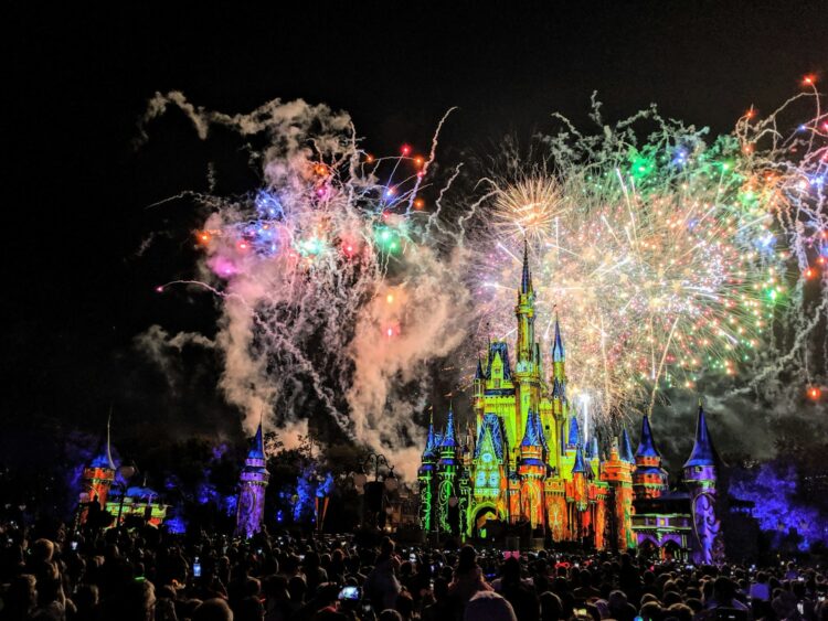 Fireworks over Cinderella’s Castle at Magic Kingdom during VIP Disney vacation – planned by luxury Disney travel agents