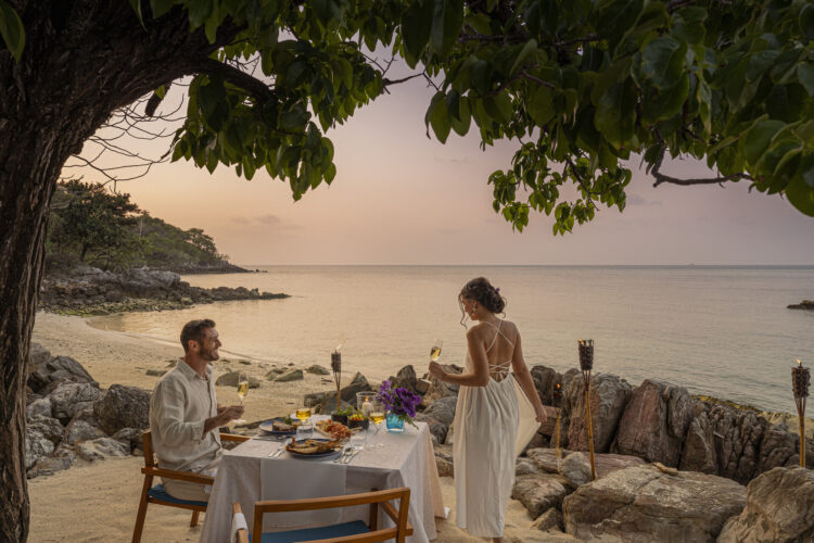 Romantic beachfront dinner in Thailand – luxury travel experience at sunset
