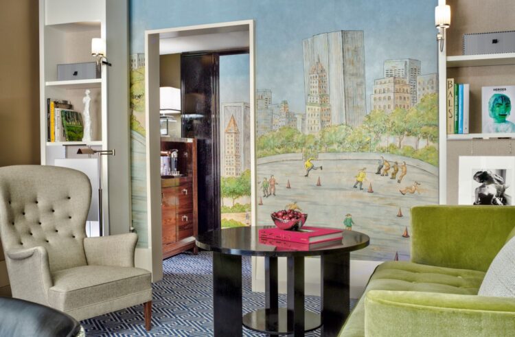 Stylish hotel suite with mural of Central Park and vintage furnishings
