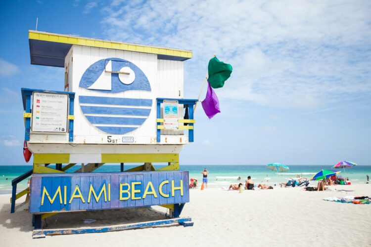 Colorful lifeguard tower on Miami Beach during a sunny ladies weekend getaway.
