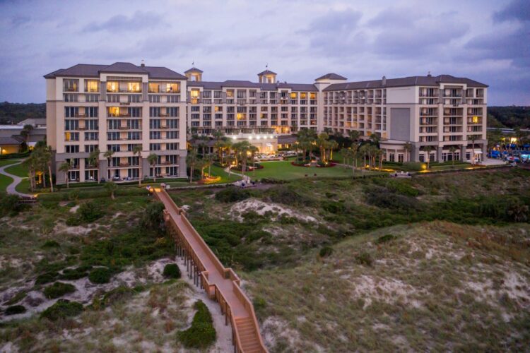 The Ritz-Carlton Amelia Island Florida at dusk with beach boardwalk and dunes