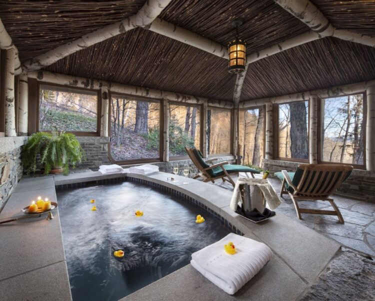 Twin Farms Vermont private hot tub spa pavilion with forest views
