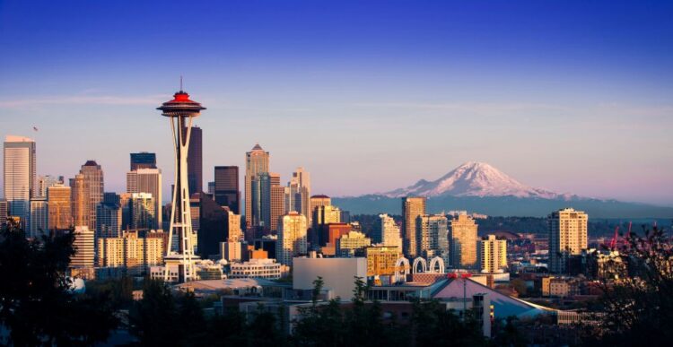 Seattle Washington skyline with Space Needle and Mount Rainier — luxury family fun city vacation in the Pacific Northwest