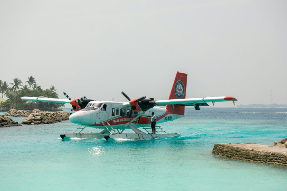 Seaplane arrival at a private island resort with controlled access