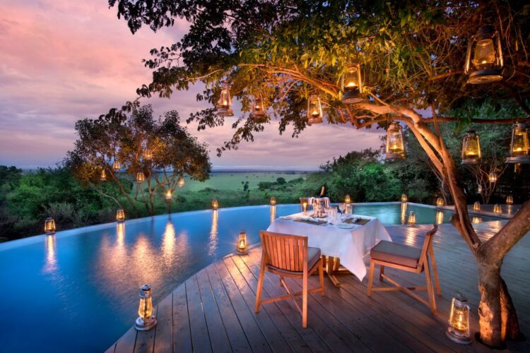 Luxury safari anniversary dinner with private candlelit setting