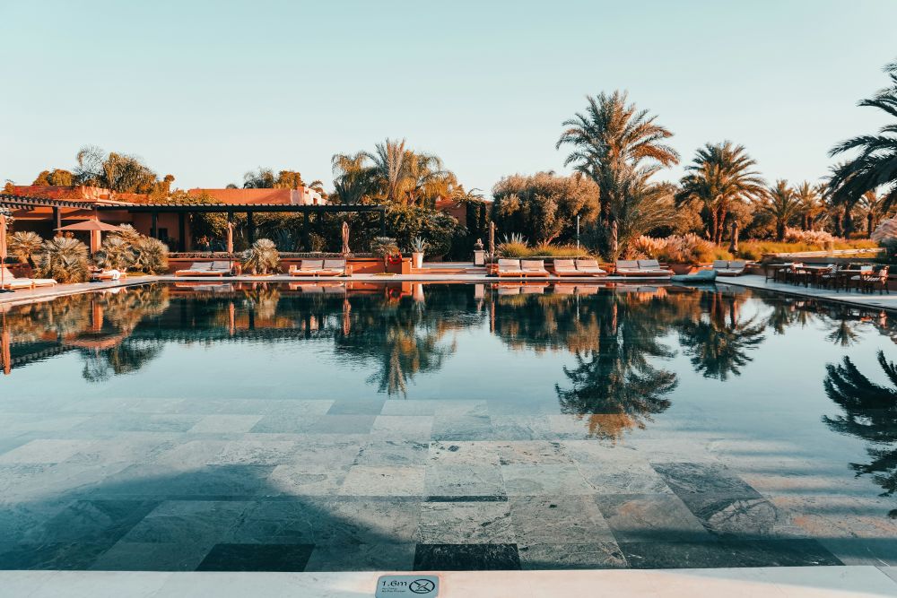 Luxury riad courtyard pool in Marrakech, Morocco, one of the best places to travel in October for high-end travel