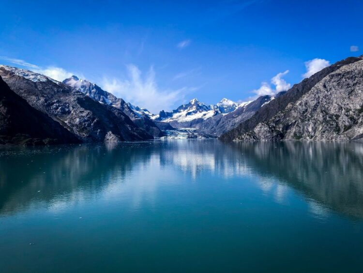 Glacier and mountain landscape in Alaska, one of the best places to travel in July by luxury cruise