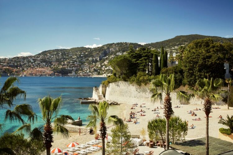 Beach and coastline at Four Seasons Cap Ferrat on the French Riviera, one of the best places to travel in July