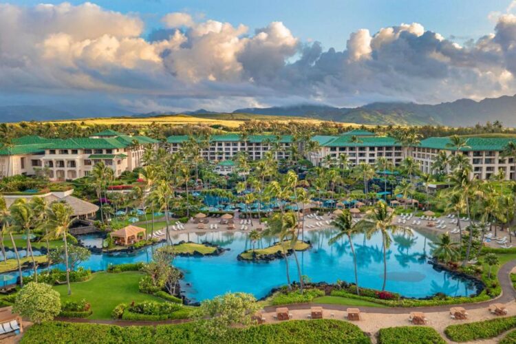 Luxury beachfront resort at Grand Hyatt Kauai with lagoon pools and ocean views highlighting Hyatt Privé benefits experience