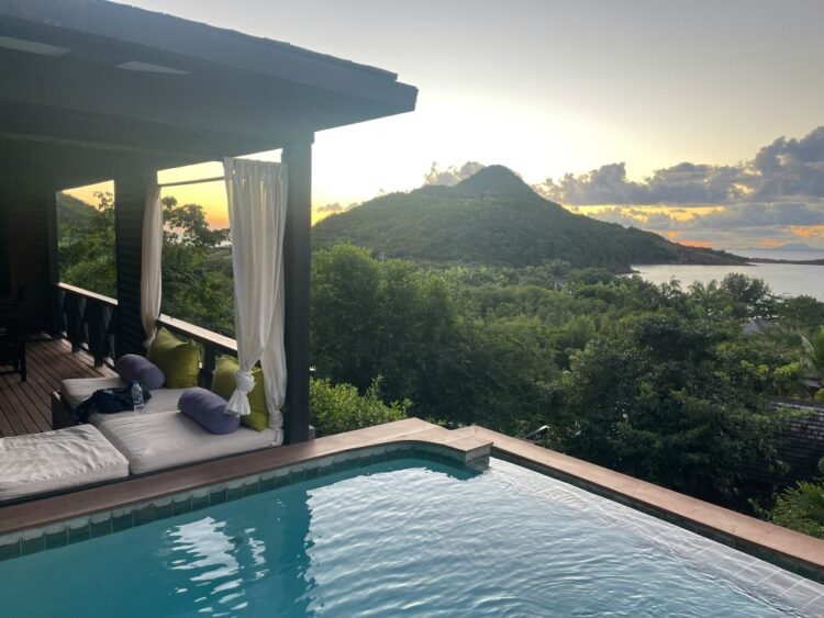 luxury private villa Seychelles infinity pool sunset ocean view