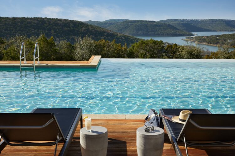 Luxury wellness retreat at Miraval Austin with infinity pool and nature views highlighting Hyatt Privé benefits experience