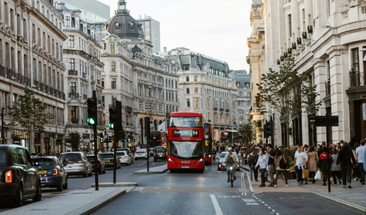 Covent Garden London street with red double-decker bus in central London